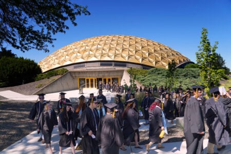 image of graduates in front of dome